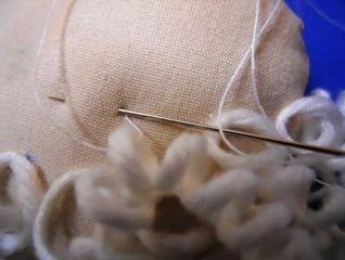 How to sew yarn hair to Chubby Angel doll head