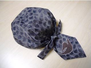 Dew rag with tail tucked under ties